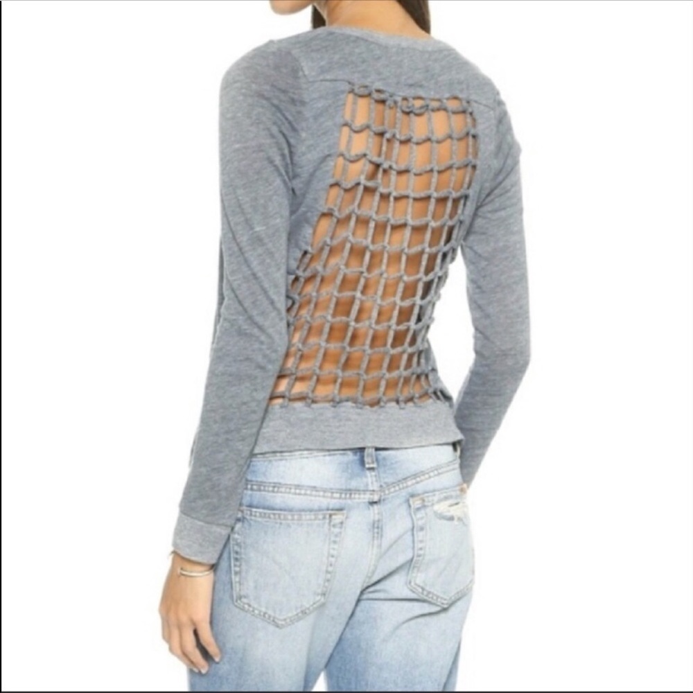 Chasor knotted open back long sleeve.  Size M